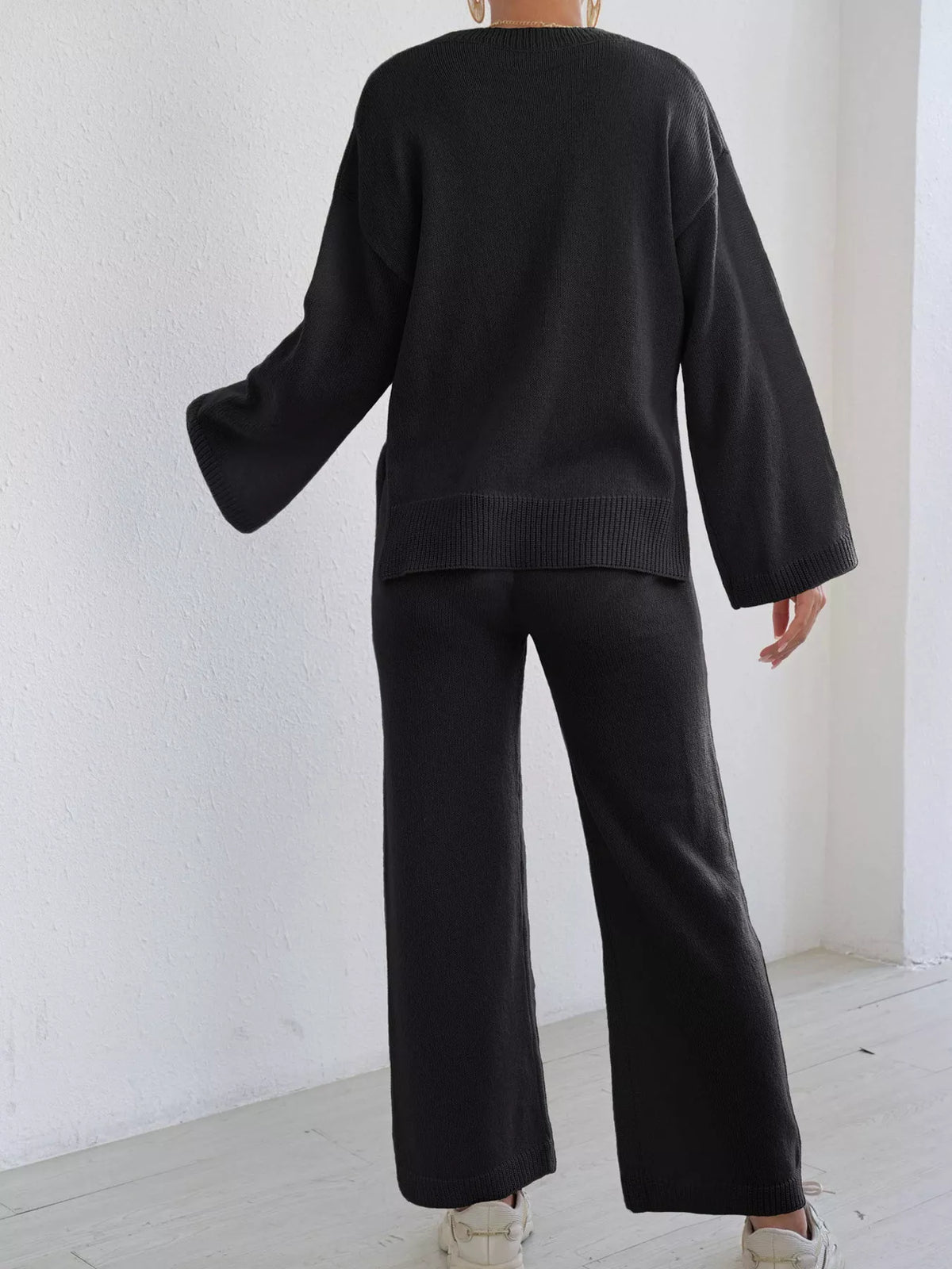 Black back view dropped-shoulder knit sweater and wide-leg pants set