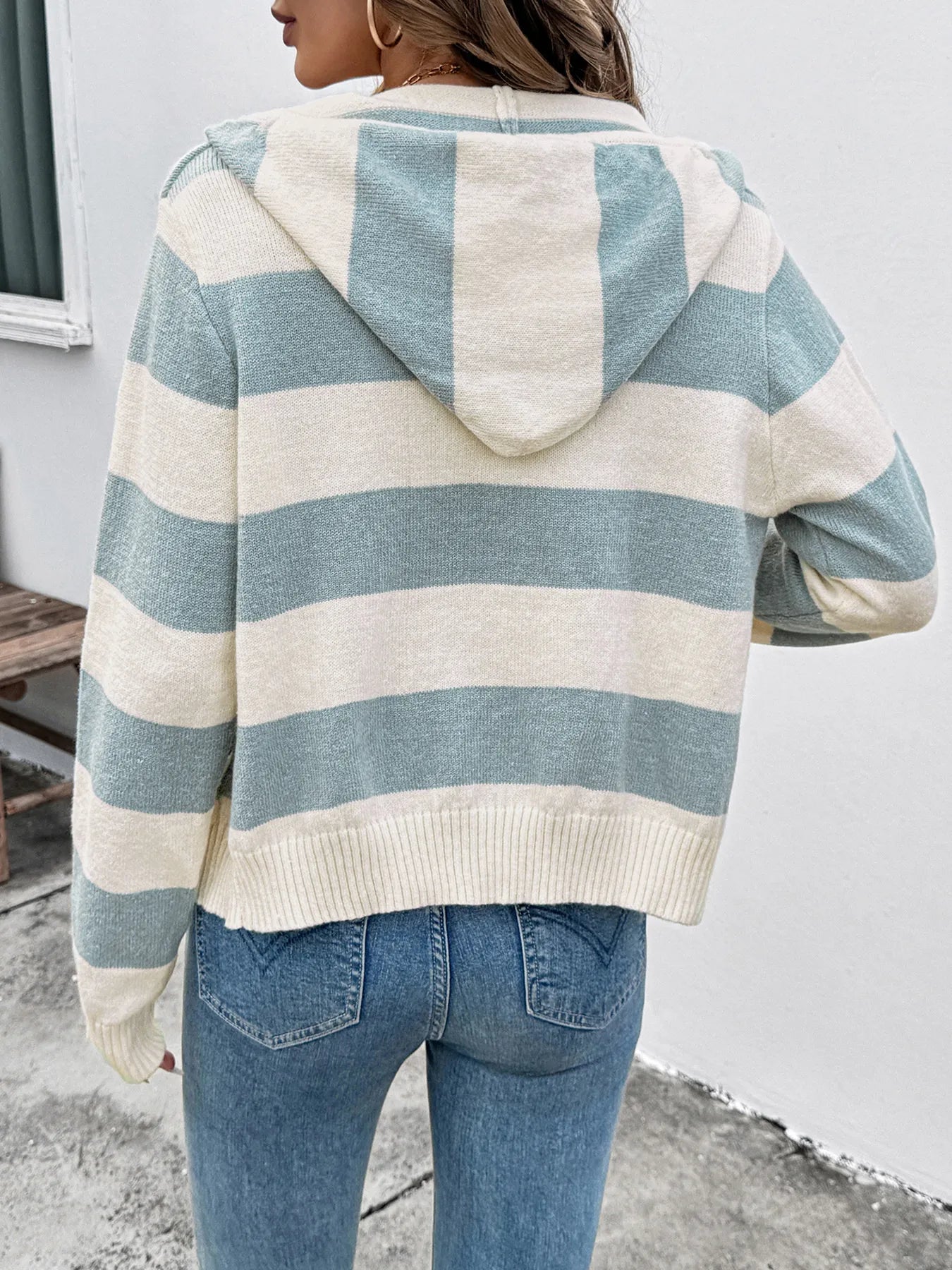 Striped cardigan back with hood and drawstring, light blue and cream horizontal stripes