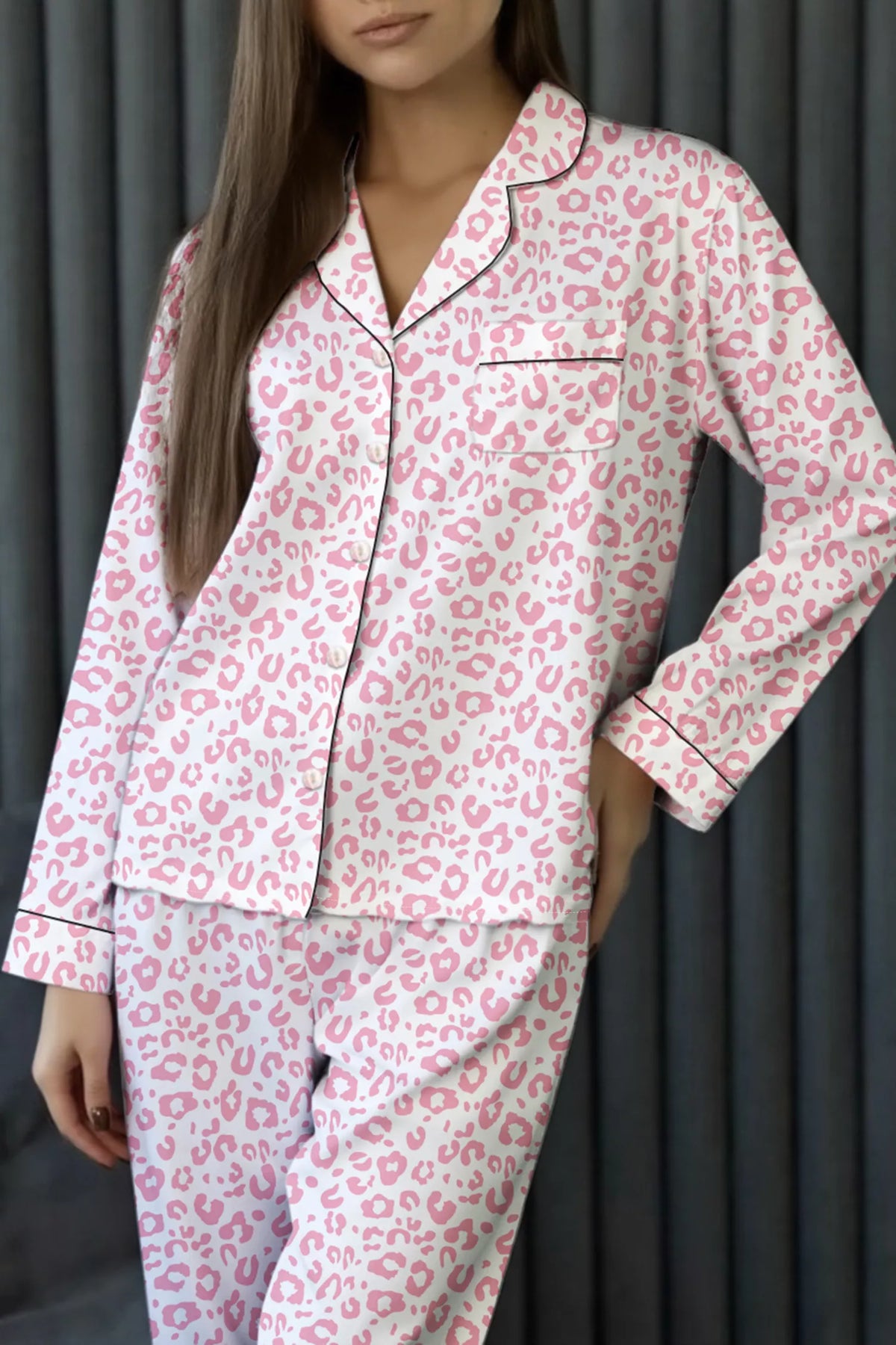 Dusty pink leopard-print pajama set with button-up top, chest pocket, and matching pants