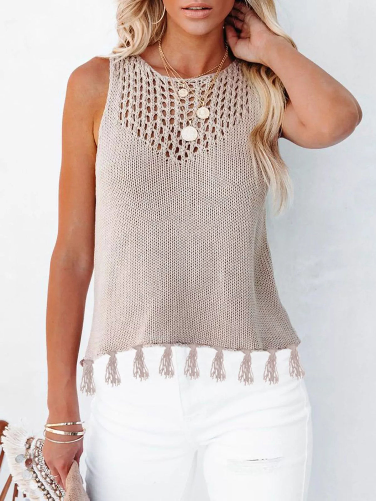 Apricot openwork knit tank top with tassel fringe hem and round neckline