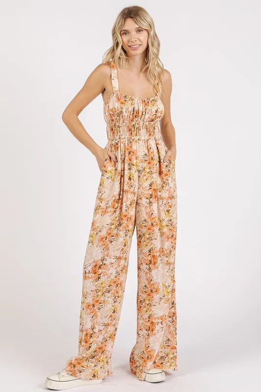 Peach floral sleeveless jumpsuit with gathered bust, wide-leg trousers and ankle length
