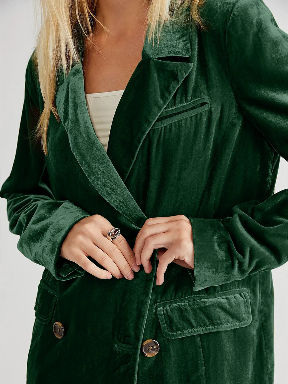 Dark green long-sleeve blazer with notch lapel, front pockets, button cuffs