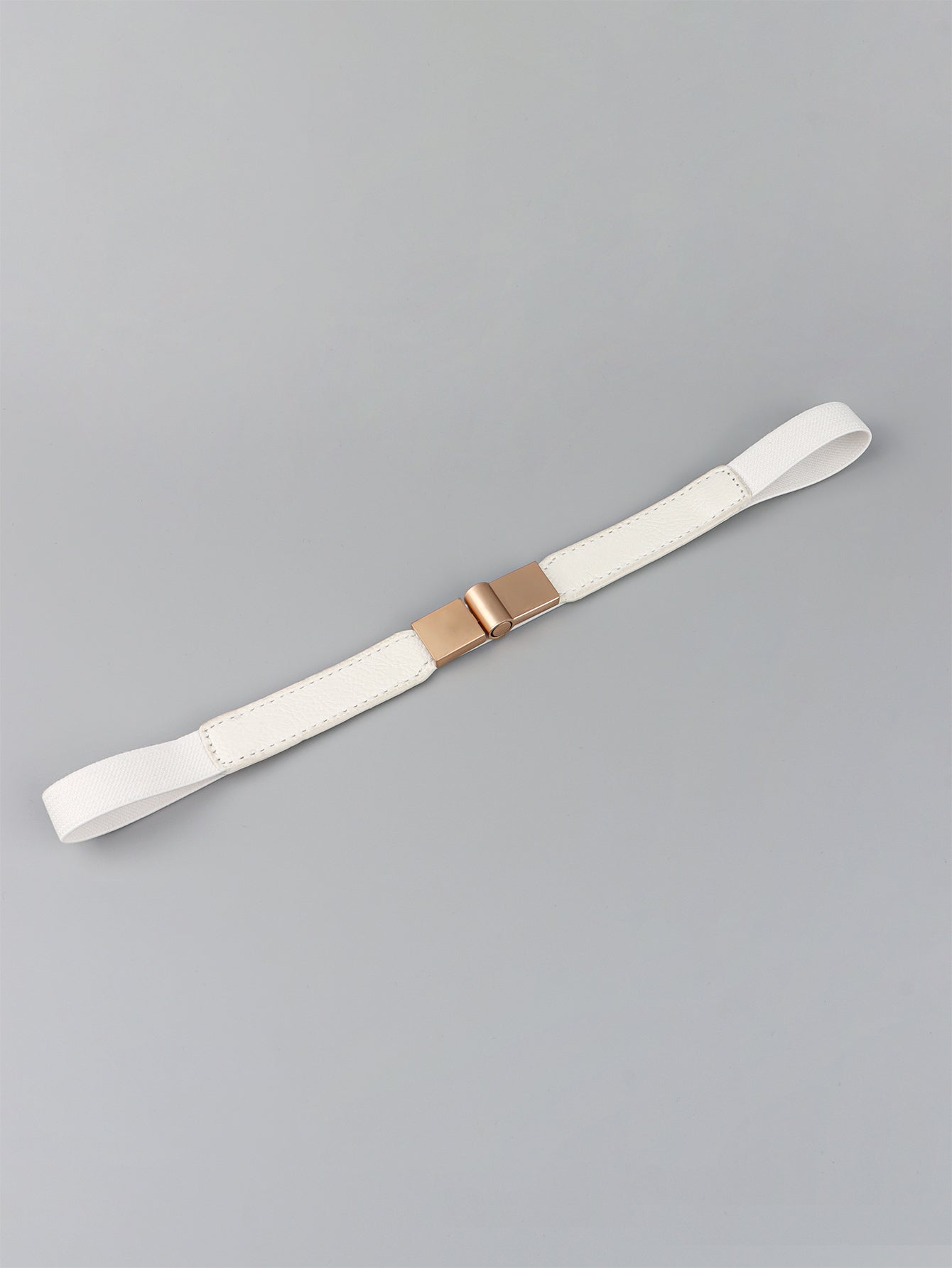 Elastic vegan leather skinny belt, white with rose-gold buckle hardware