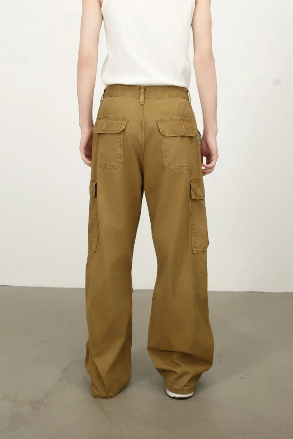 Khaki mid-rise cargo jeans with two front cargo pockets