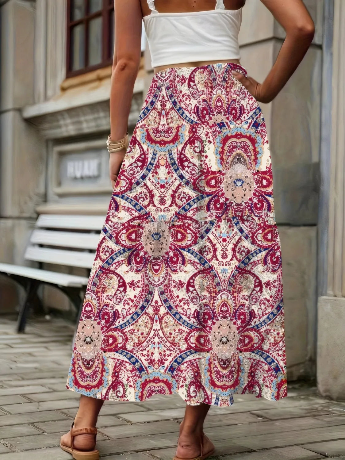 High-waist smocked printed skirt, red paisley; mid-calf flare with elastic waist