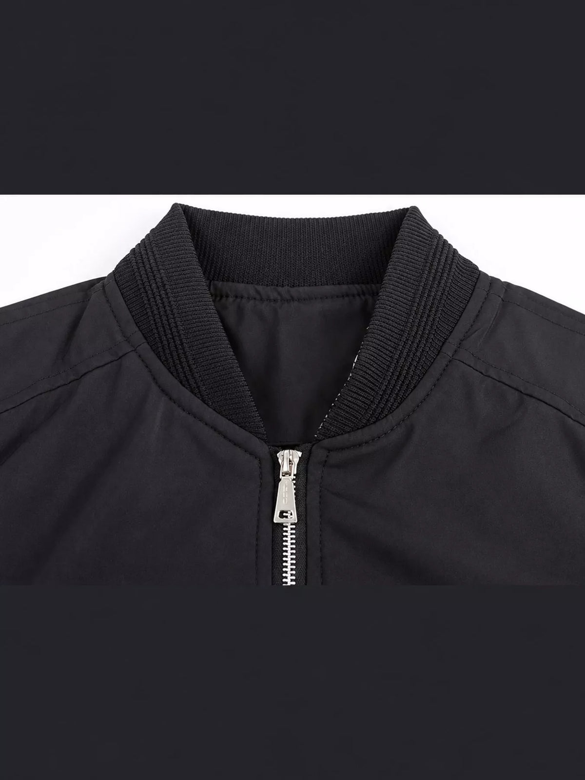 Men's lightweight bomber jacket close-up: front zipper with stand collar, black