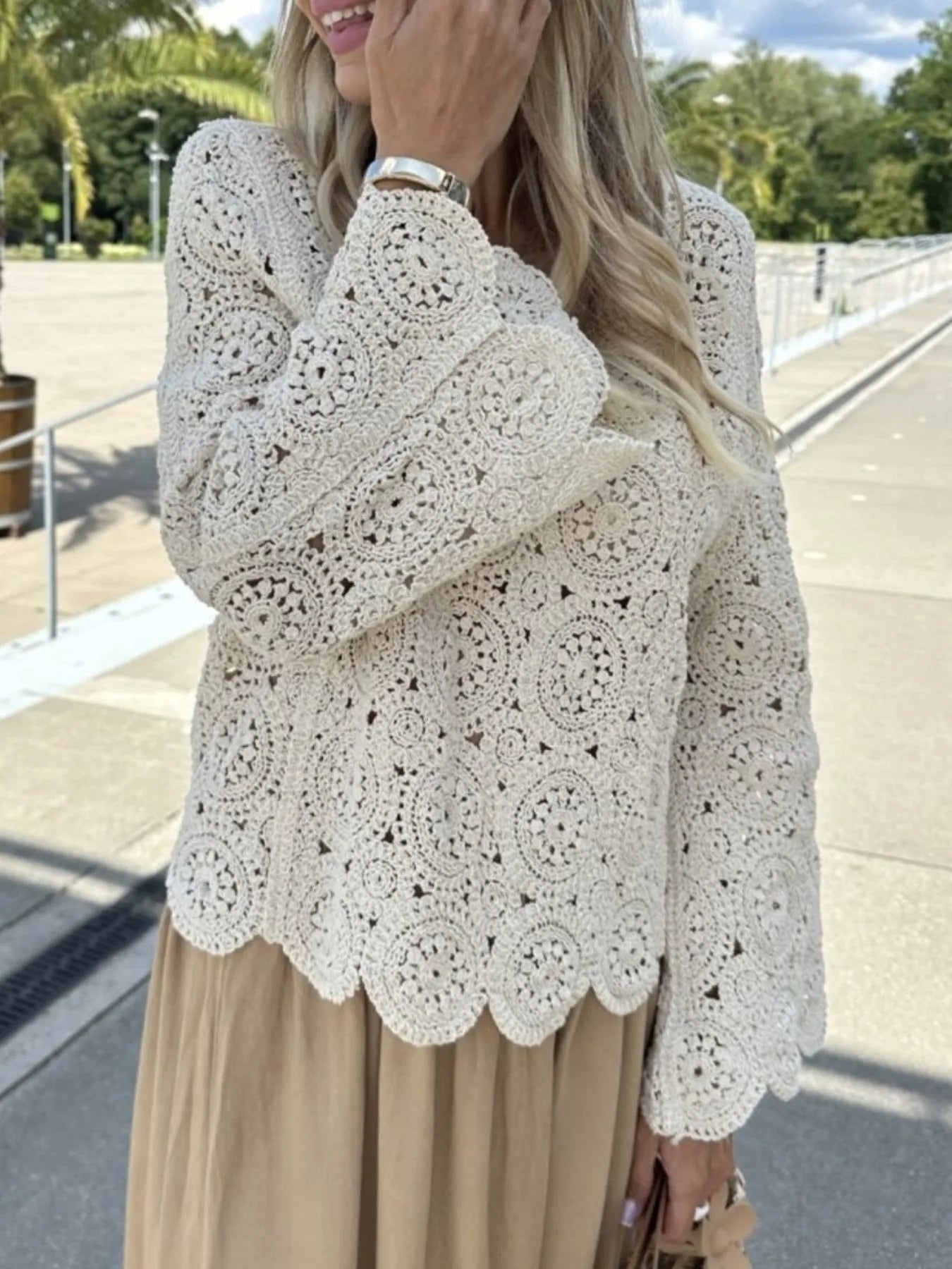 White crochet lace bell sleeve knit top with V-neck and openwork circle pattern