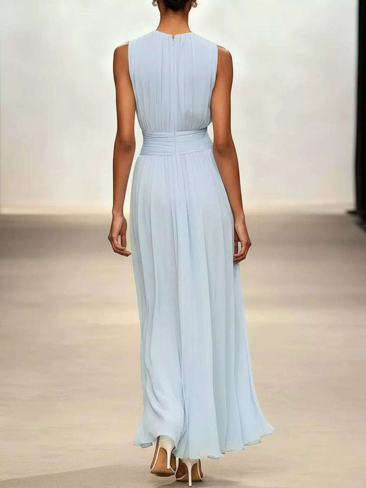 Light blue sleeveless chiffon maxi dress with gathered waist and vertical pleats