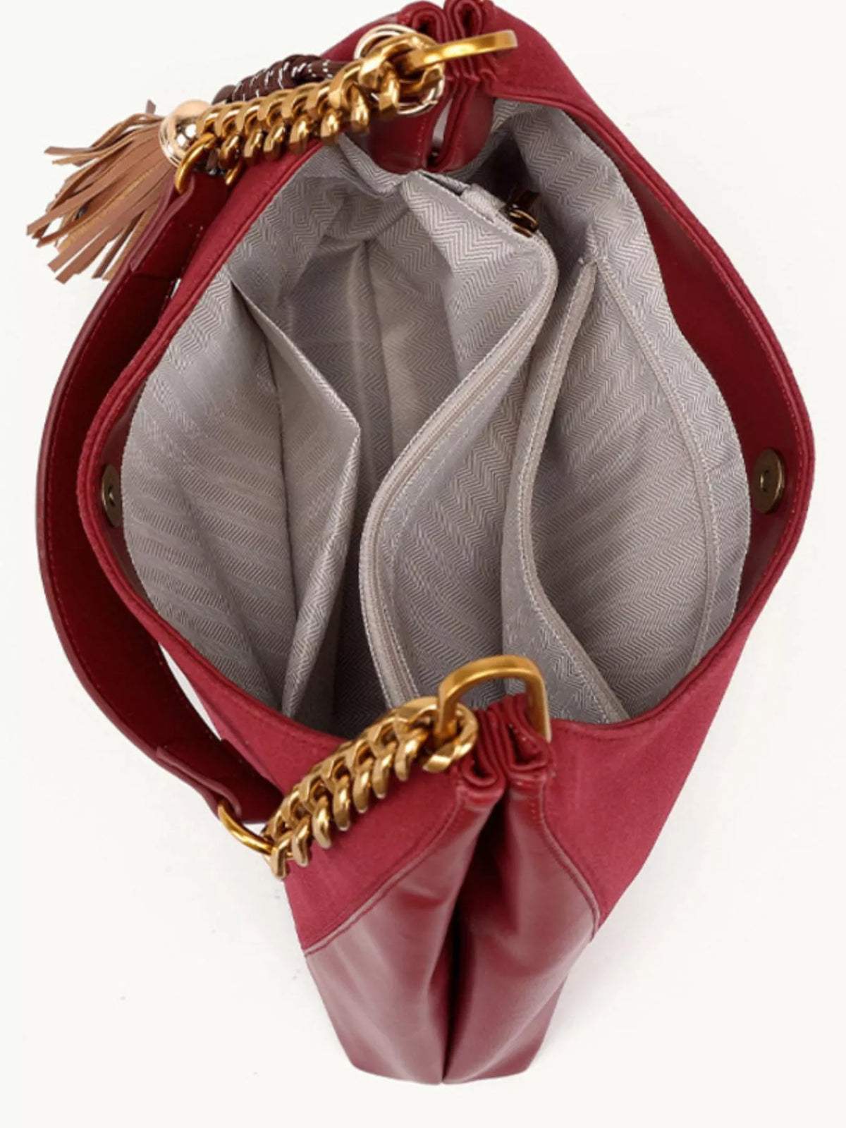 Wine red suede shoulder bag with open top, lined interior, and gold chain strap.