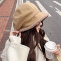 Khaki plush-trim baker boy hat with teddy-like edge and side seam detail