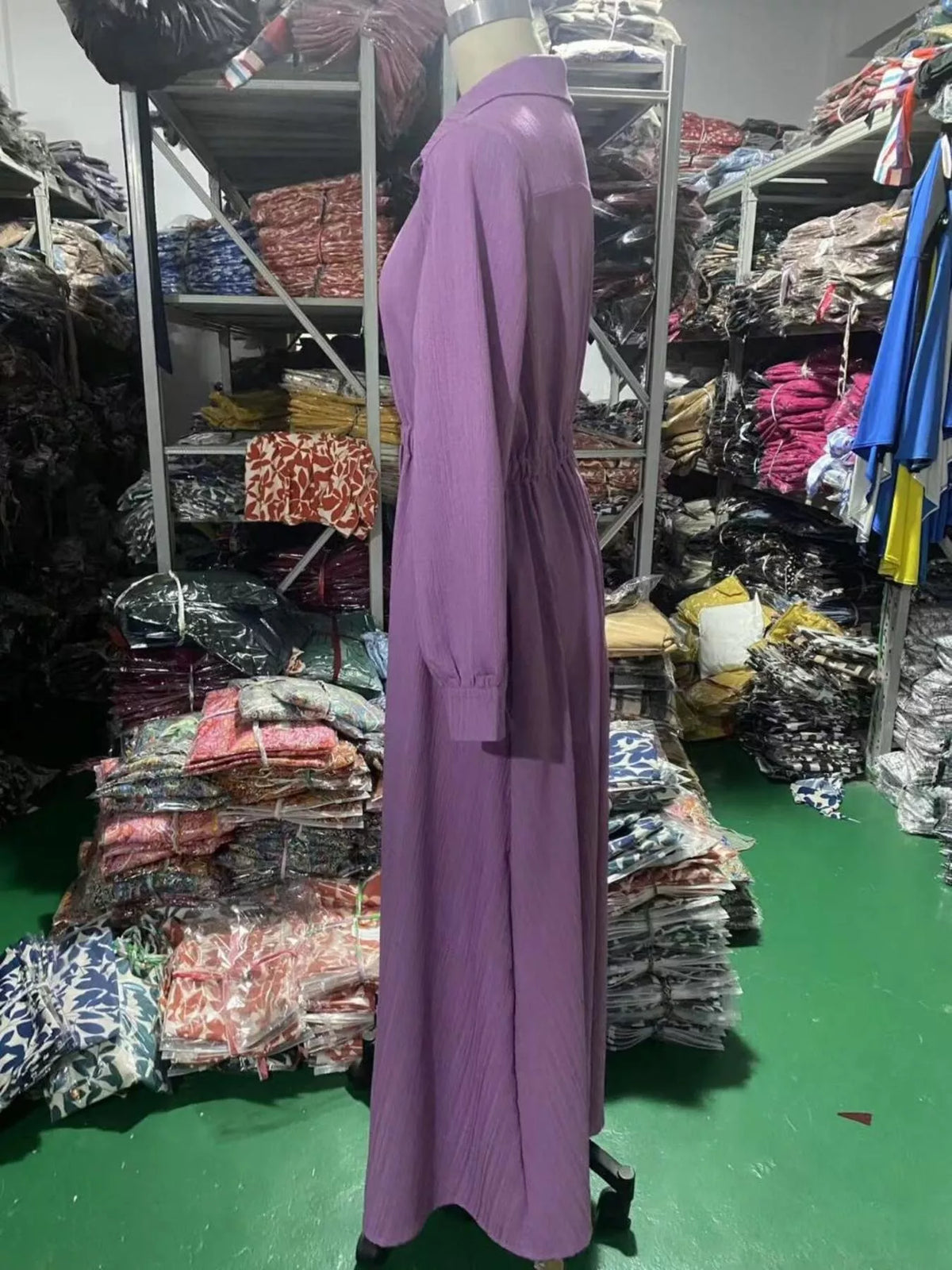 Lilac maxi button-front shirtdress side view with long sleeves and flowing skirt