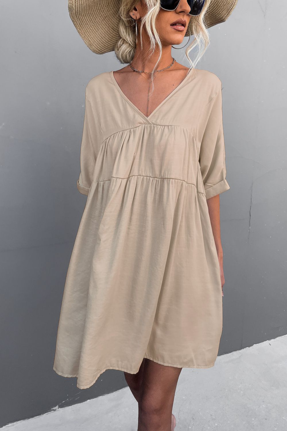 Apricot V-neck mini dress with tiered skirt and short sleeves