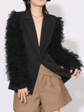 Black long-sleeve blazer with one-button front and fluffy tulle sleeve trim
