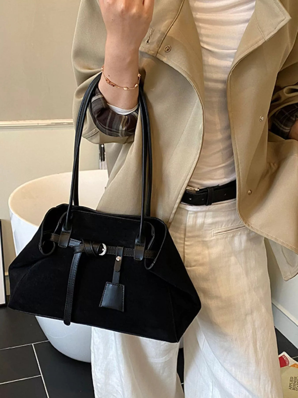 Black suede buckle shoulder bag with top handles and front square patch pocket