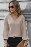 Mocha V-neck blouse with pleated lantern sleeves, long cuffed cuffs