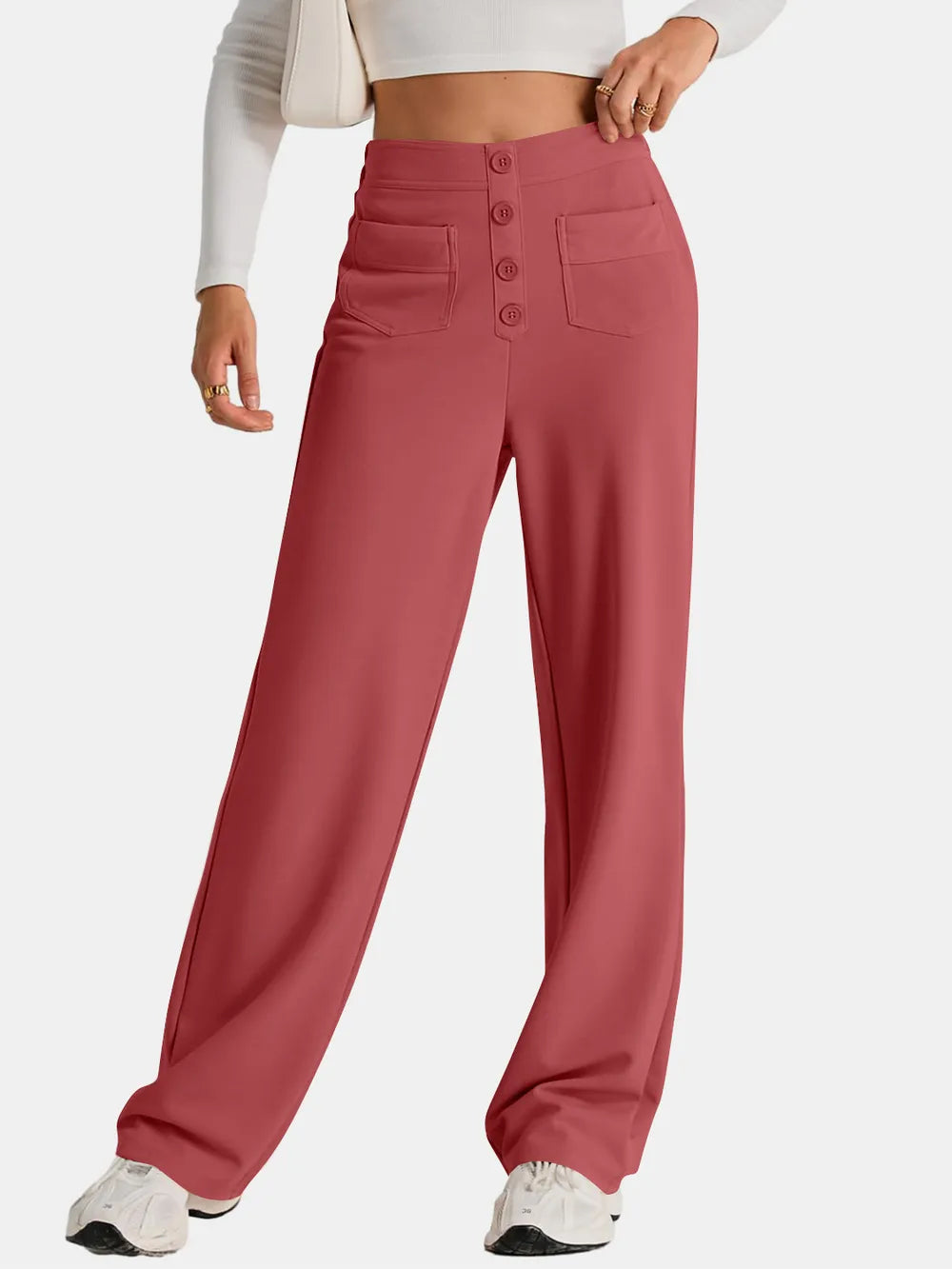 Orange-red high-waist wide-leg pants with button-front placket and two front pockets