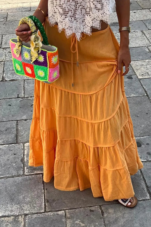 Tangerine tiered maxi skirt with drawstring waist and soft layered ruffles