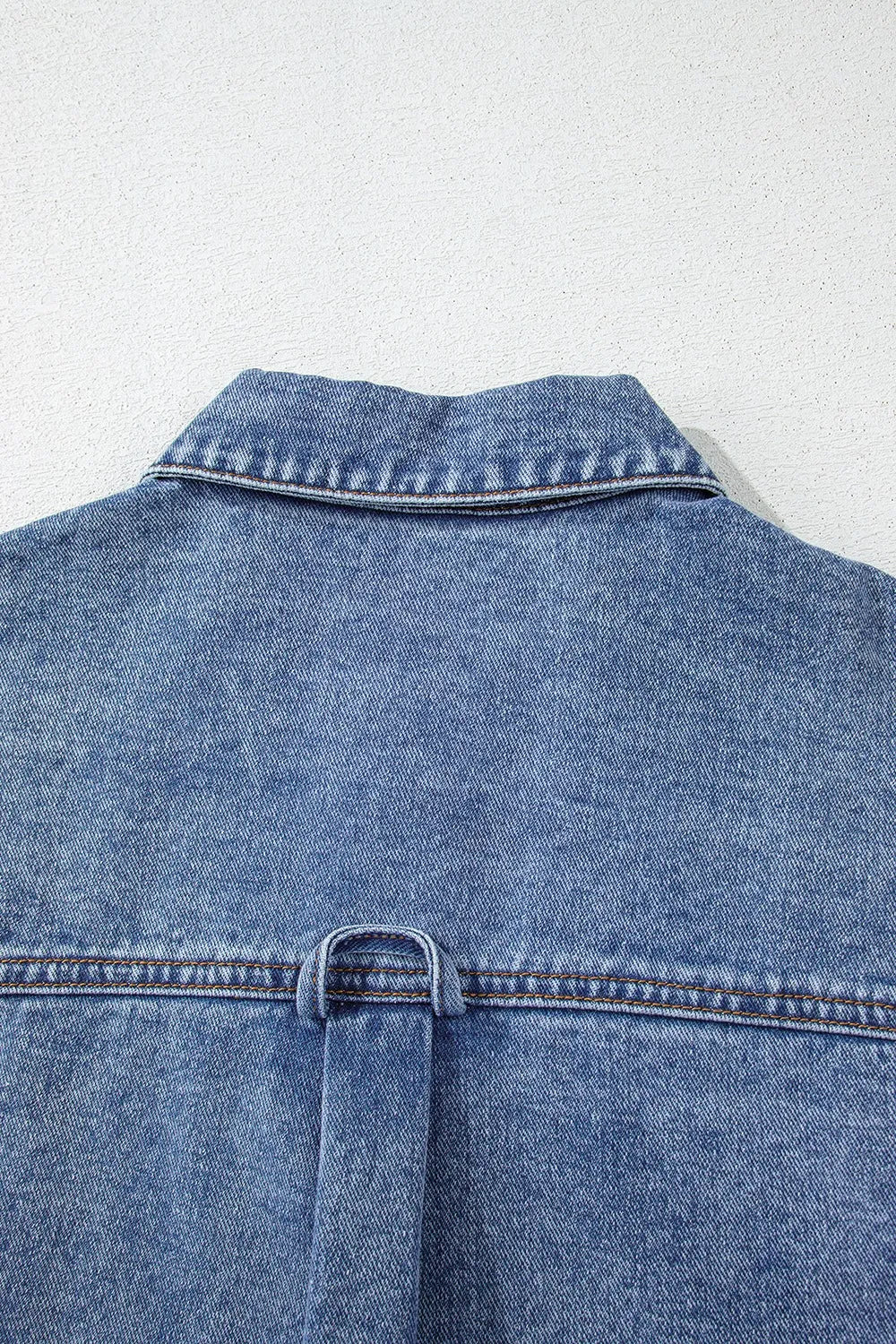 Denim jacket back with stand collar and top yoke seam