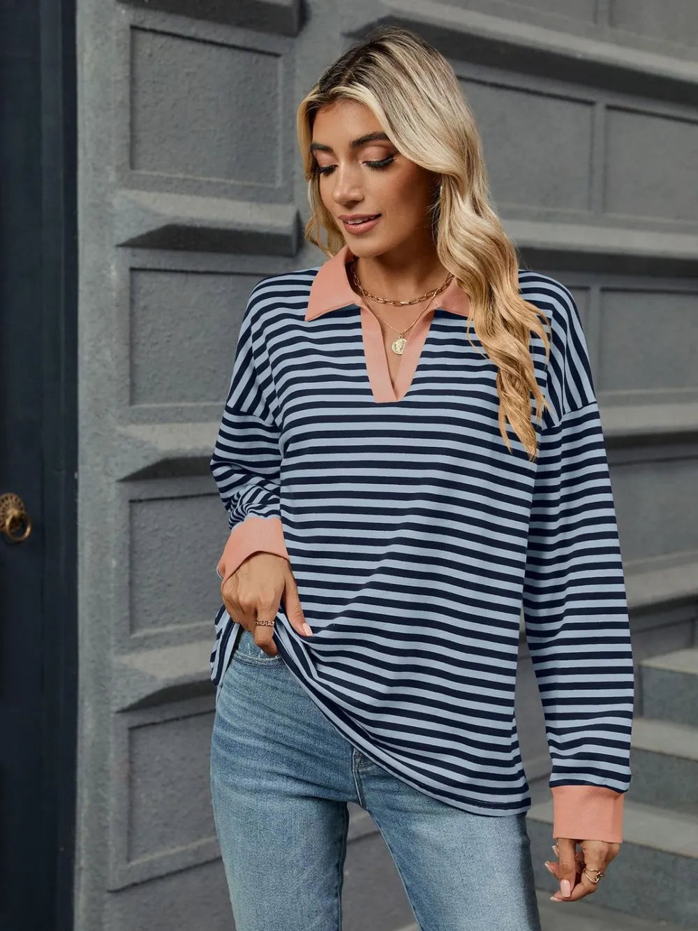 Navy and white striped long-sleeve sweatshirt with Johnny collar and tan cuffs