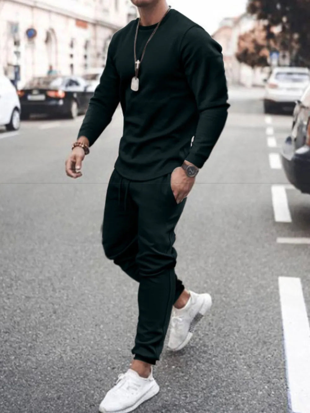 Men's black long sleeve lounge set with round neck top and tapered jogger pants