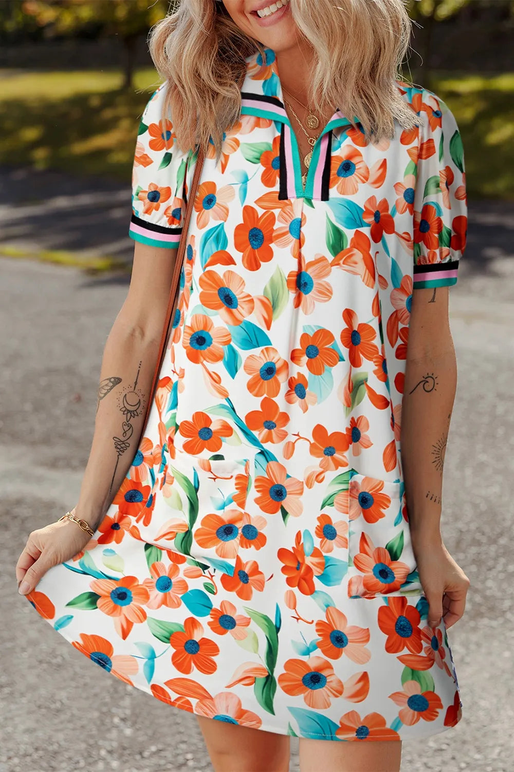 Contrast Trim Floral Split Neck Puff Short Sleeve Tiered Mini Dress; orange flowers on white with turquoise leaves