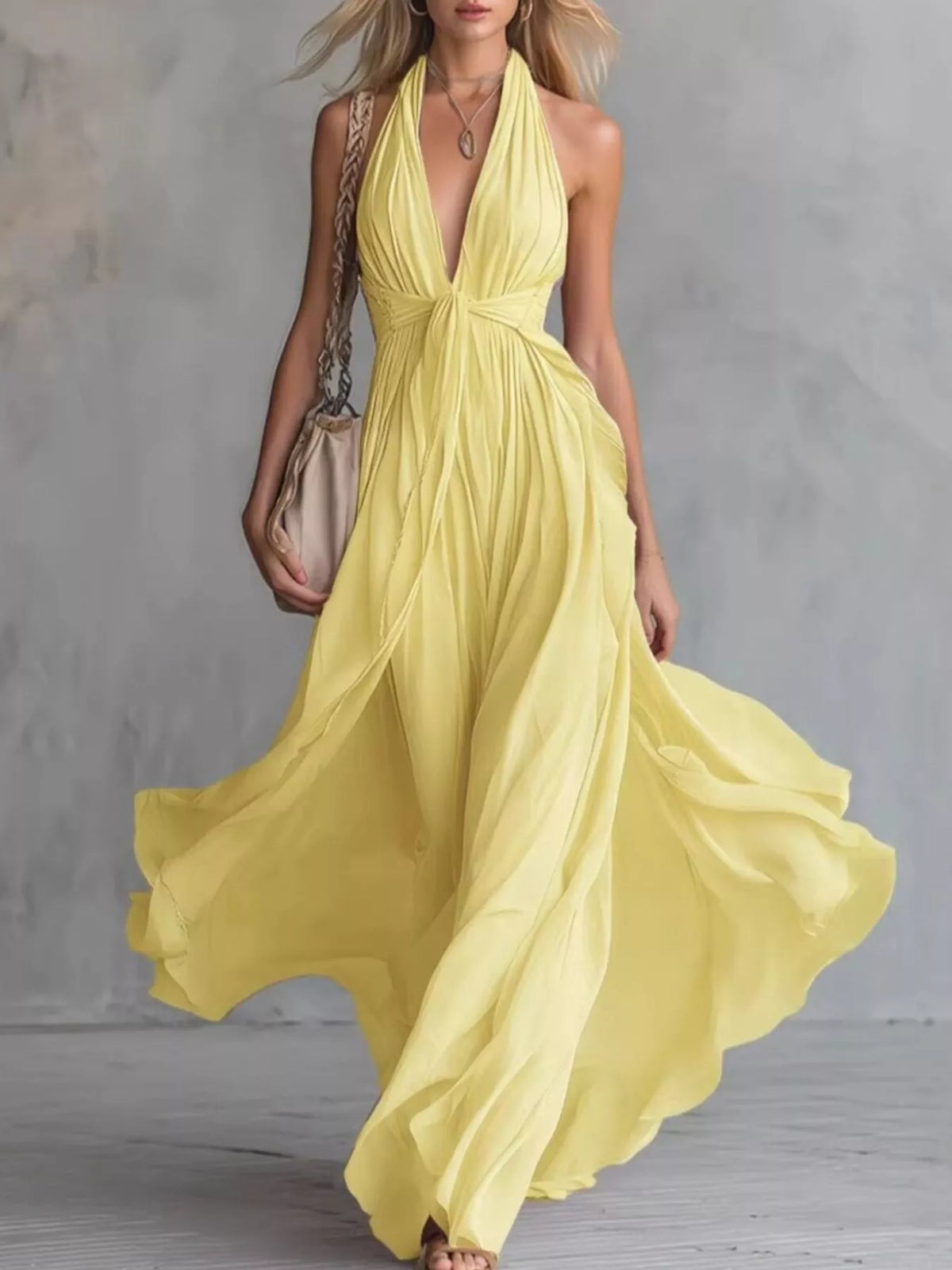 Yellow crisscross back ruched halter stretch maxi dress with gathered waist and flowing skirt
