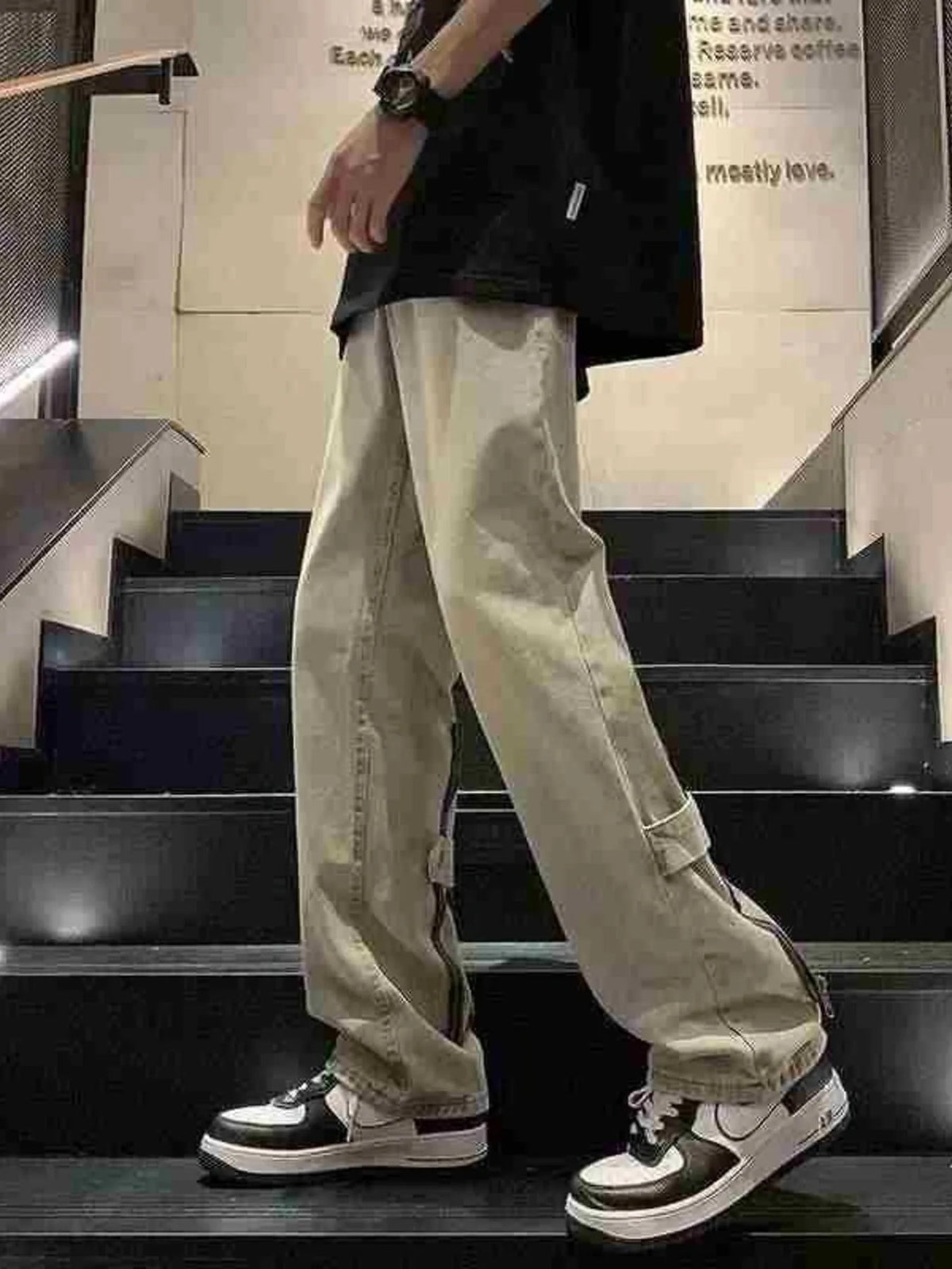 Men's washed wide-leg cotton jeans, light wash with adjustable cuff straps