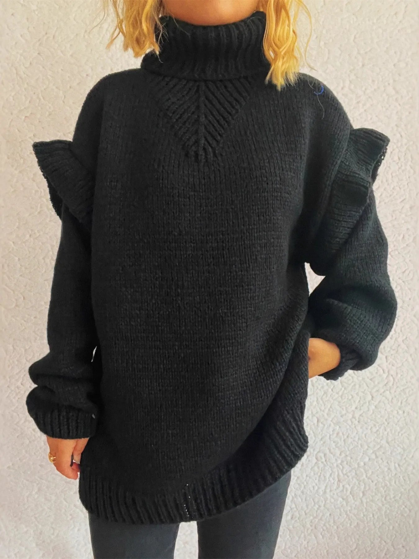 Ruffled turtleneck knit sweater, black, front view with shoulder ruffles