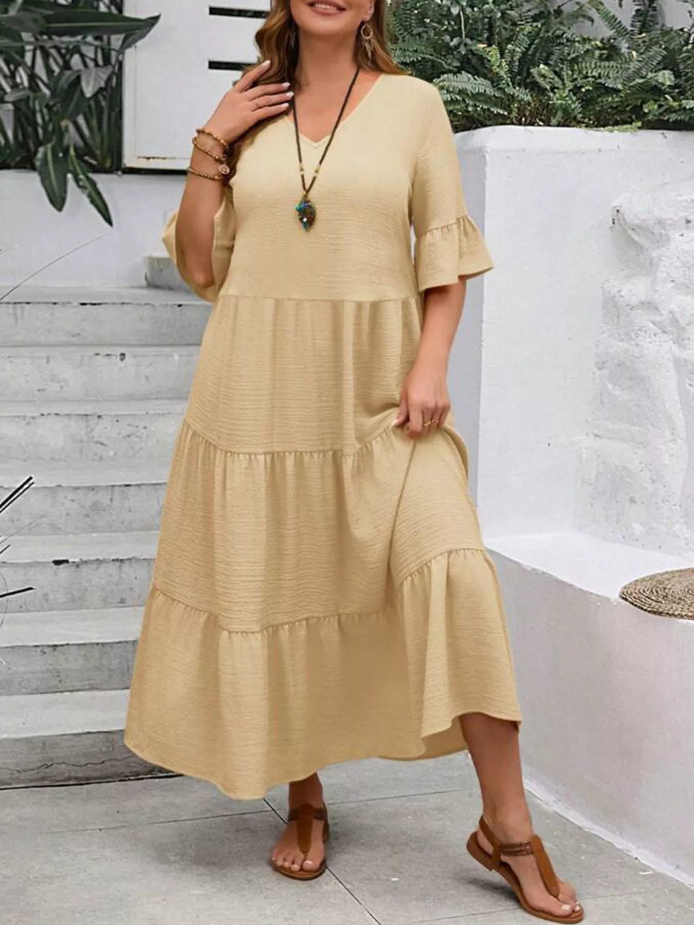 Apricot tiered midi dress with ruffle sleeves and layered skirt tiers, V-neck