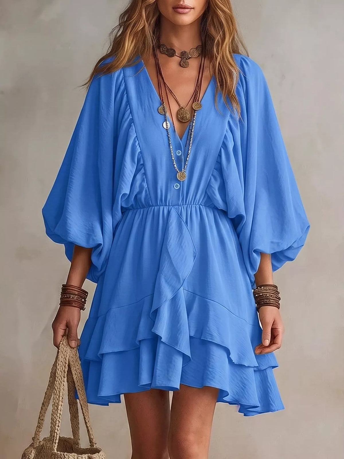 Blue tiered mini dress with ruffled balloon sleeves and V-neckline
