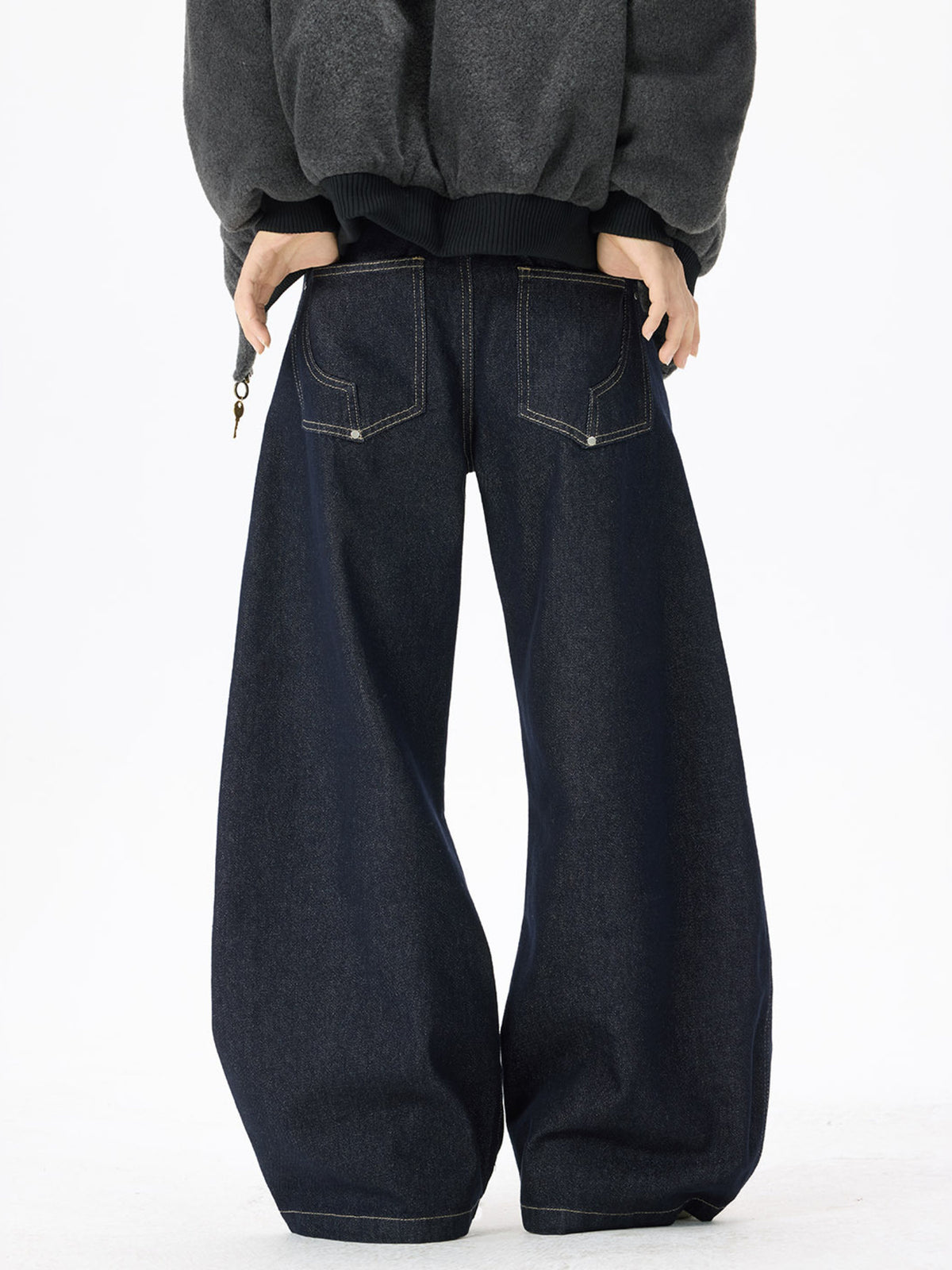 Mens wide-leg jeans in dark wash with two rear patch pockets and belt loops