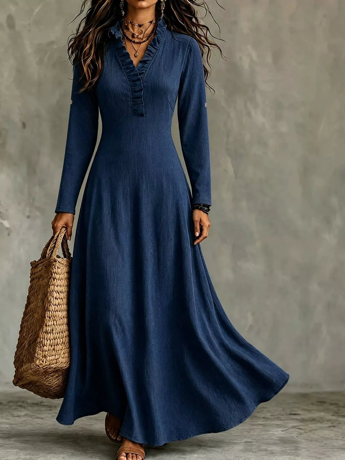 Blue maxi dress with ruffled V-neck and rolled three-quarter sleeves