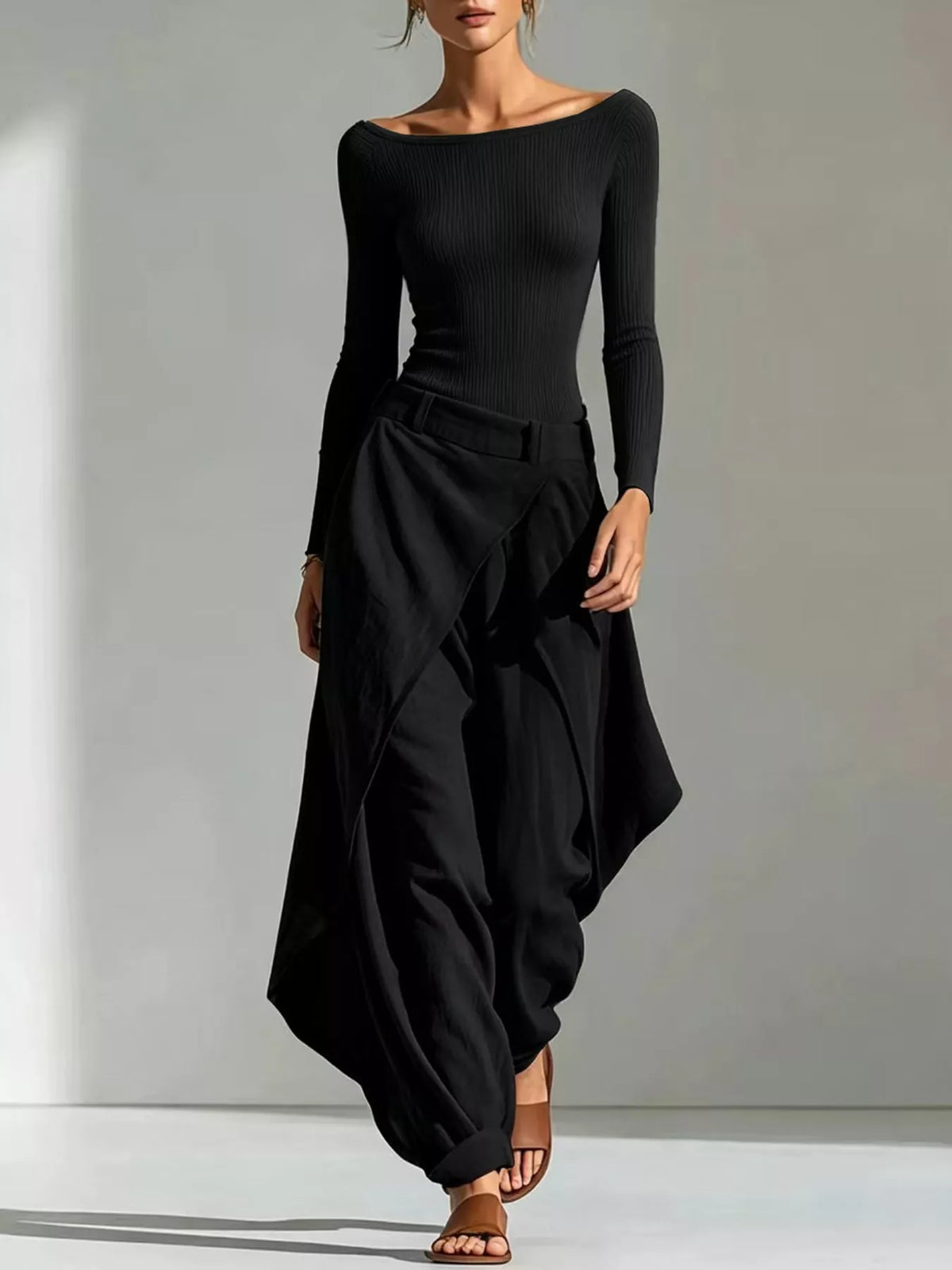 Black ribbed boat-neck long-sleeve top with draped wrap-style pants set