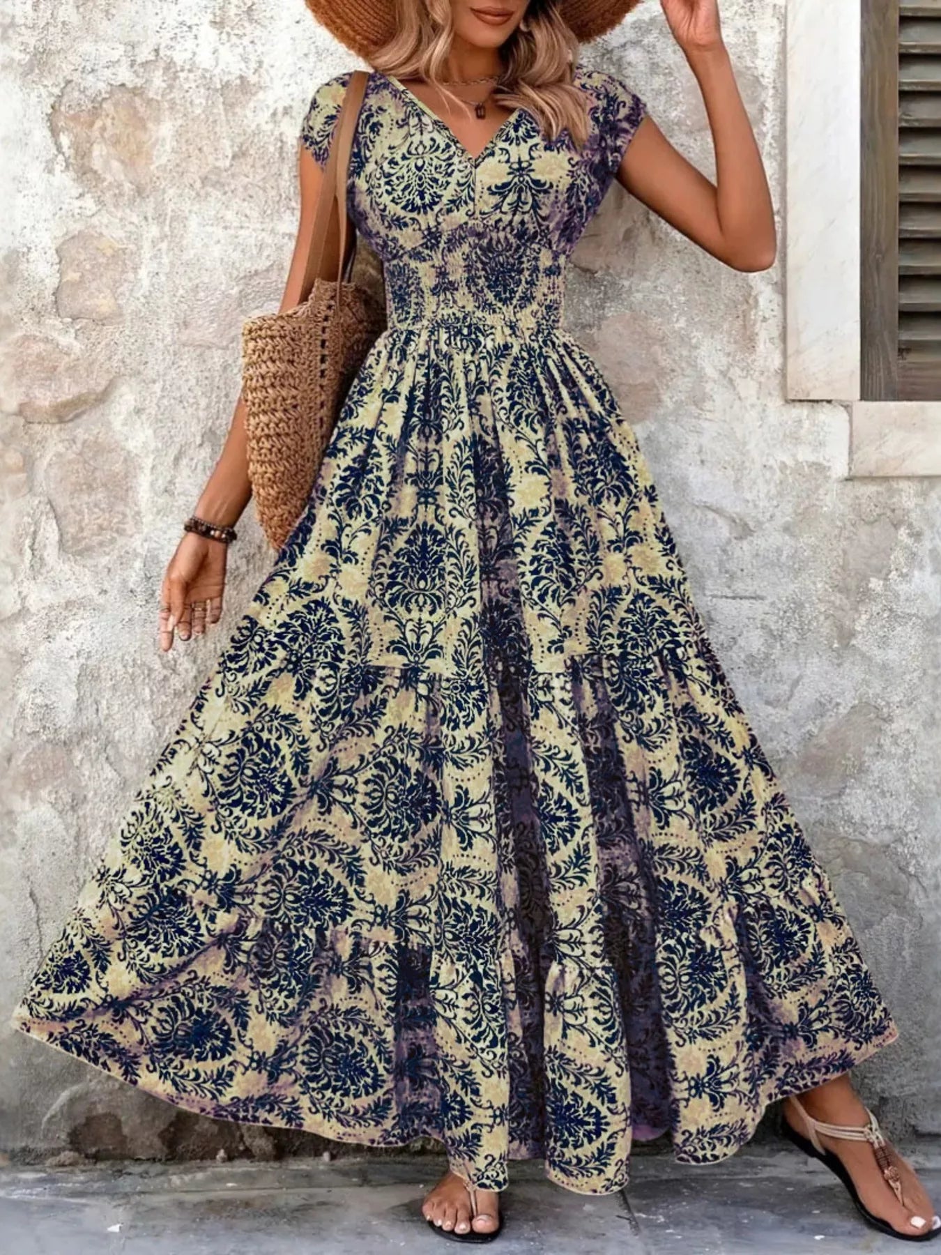 Navy blue printed V-neck tiered maxi dress with gathered waist and flared tiers