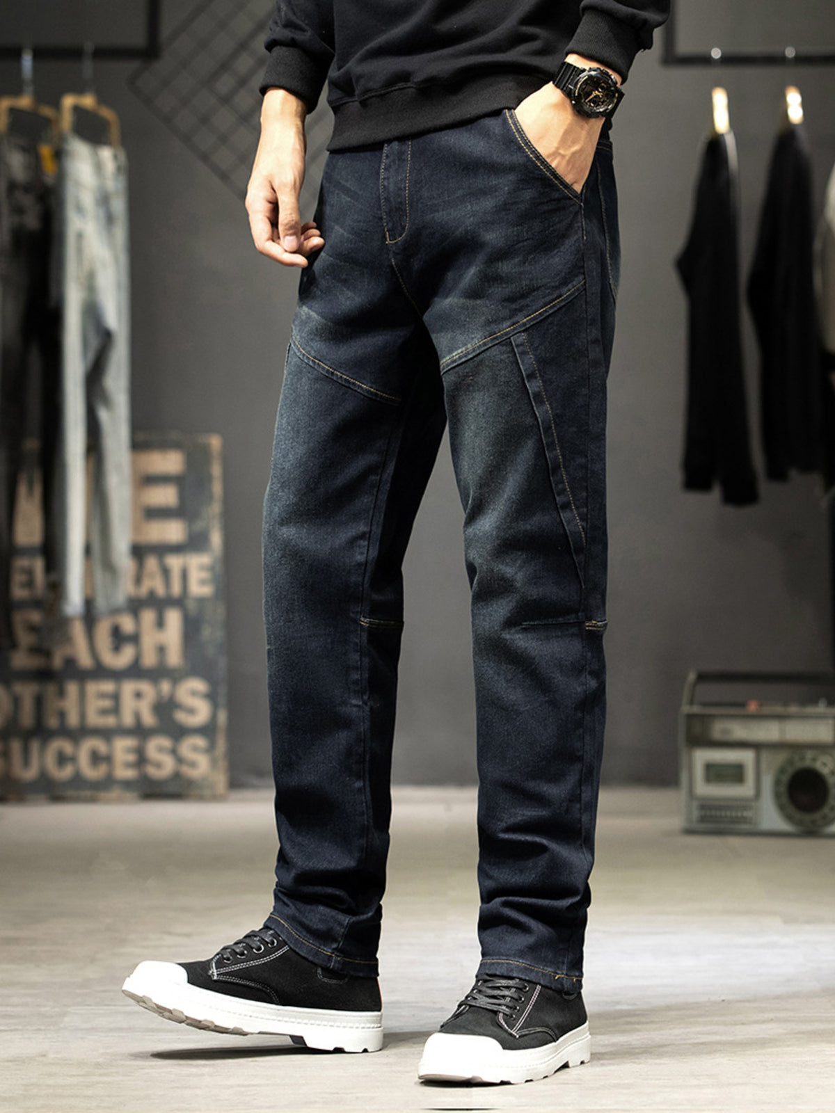 Men's slim-fit washed jeans with panel seams, dark color, five-pocket design