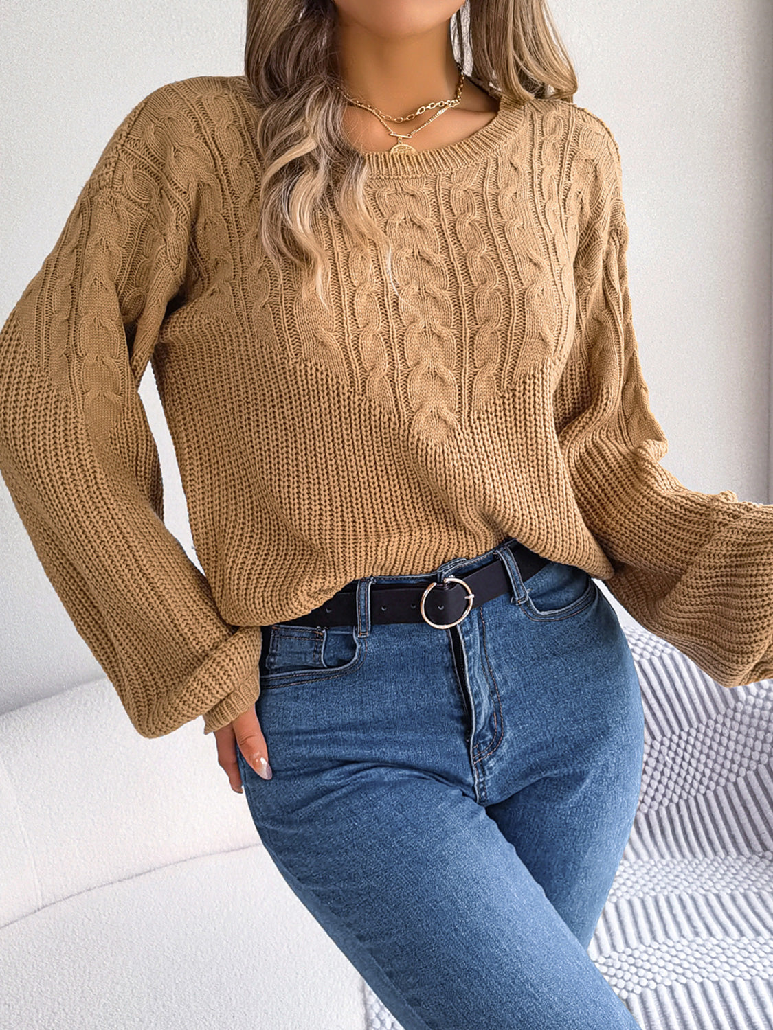 Taupe cable-knit sweater with drop shoulder, round neck, cable texture