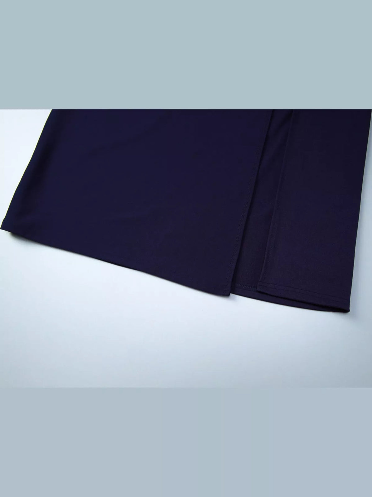 Navy maxi dress hem with side slit detail