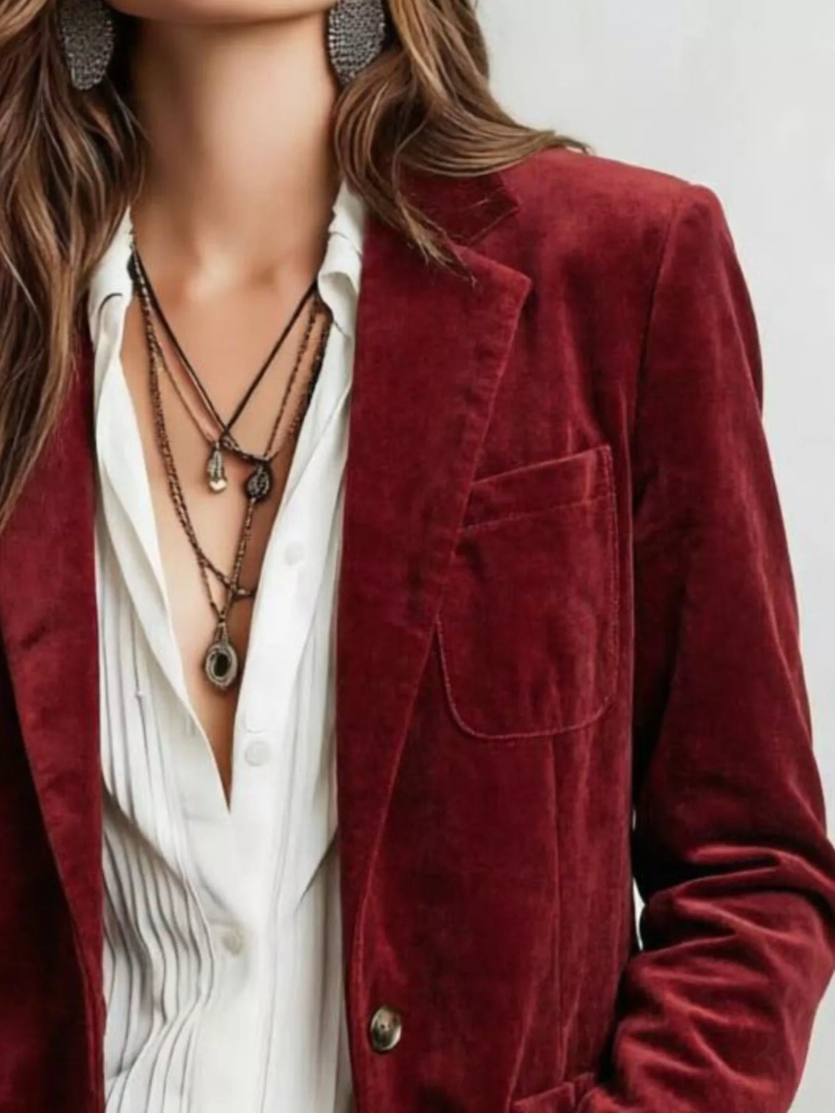 Burgundy suede blazer with lapel, flap pocket detail, button front