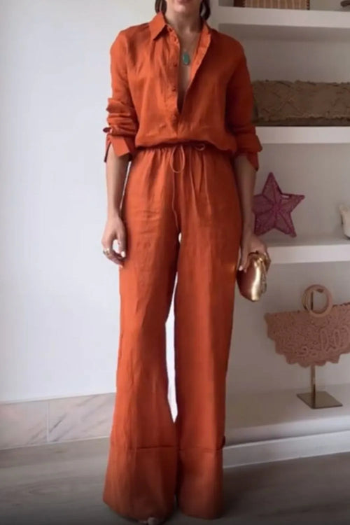 Orange button-down shirt and drawstring pants set, front view, relaxed wide legs