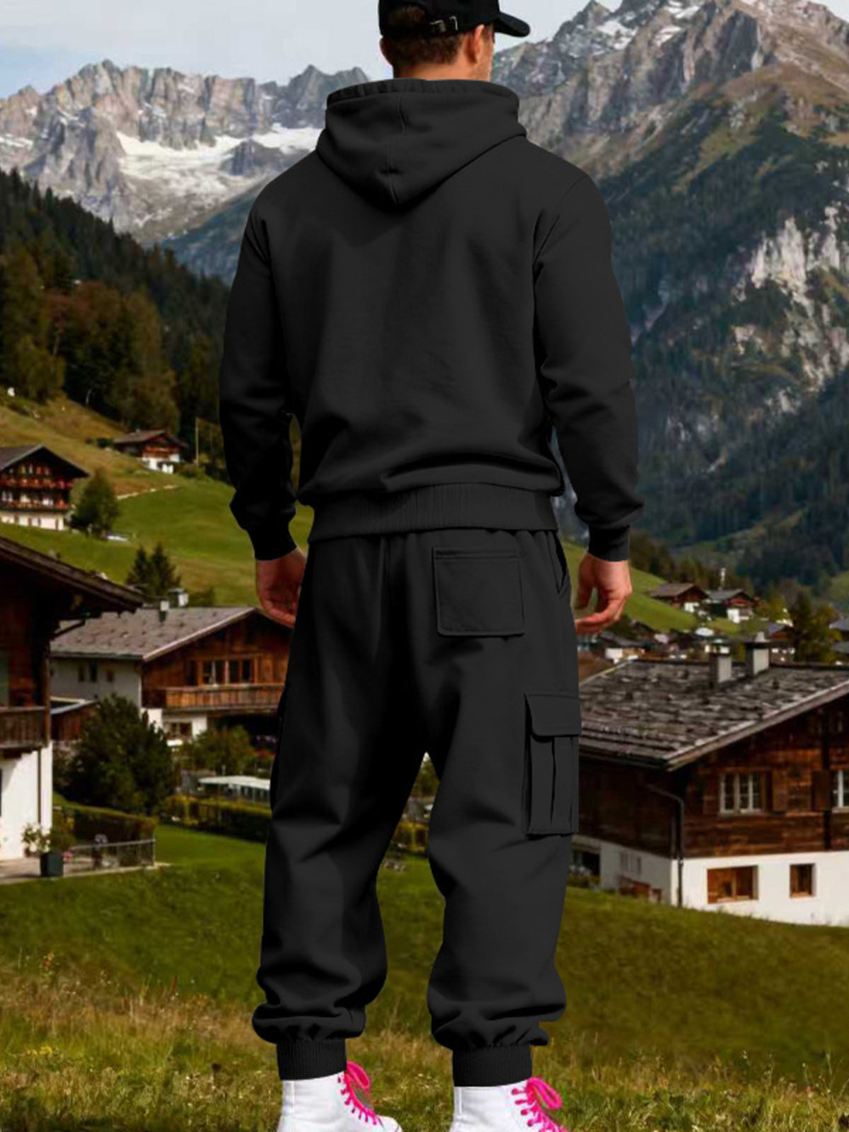 Two-piece kangaroo hoodie set: back view of black hoodie and black cargo sweatpants