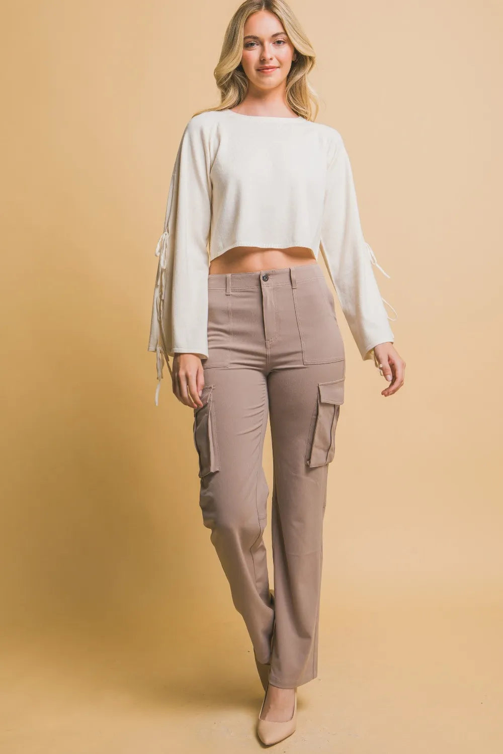 Taupe high-rise cargo pants with side cargo pockets and tapered ankle-length hem