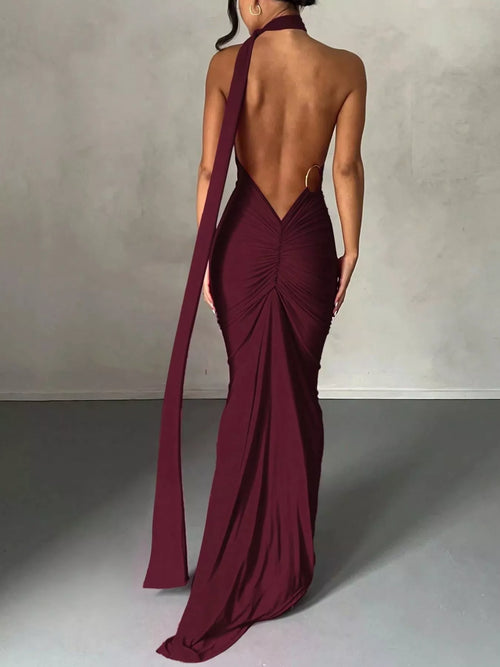 Burgundy backless one-shoulder ruched maxi dress, draped back and flowing side train