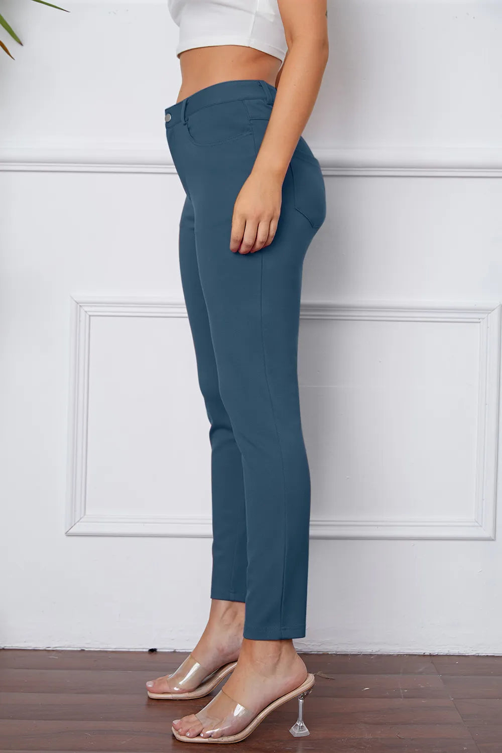 StretchyStitch pants, dark blue, side view with ankle hem, button closure, belt loops