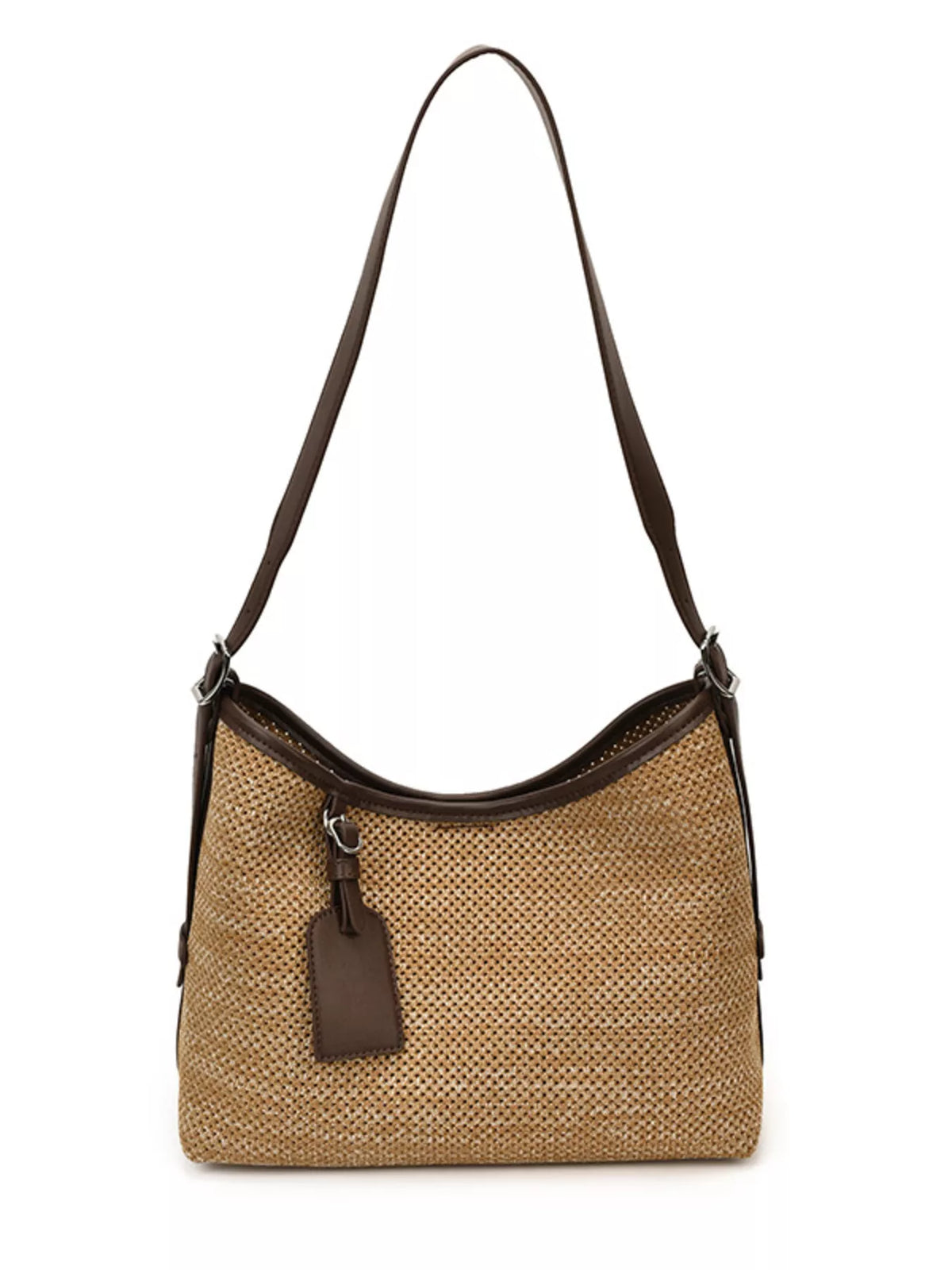 Camel woven shoulder bag with dark leather trim, front charm, and long straps