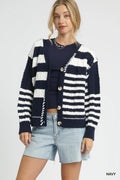 Navy button-up cable-knit cardigan with white stripe blocks and long sleeves