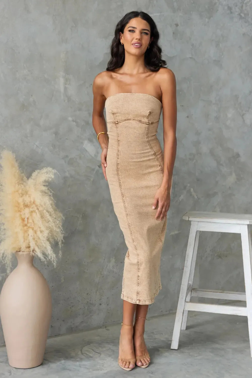 Tan washed denim tube dress, strapless fit with midi length and back slit