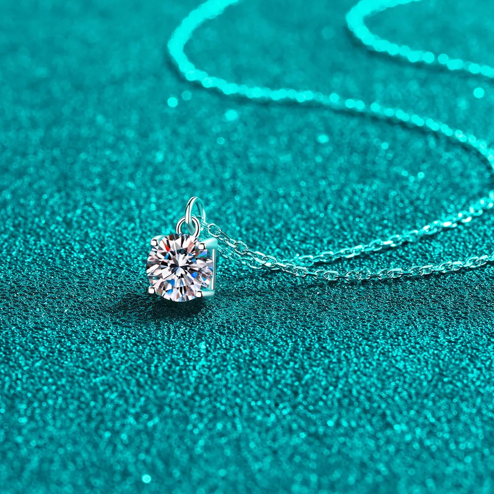 Sterling silver necklace with round moissanite solitaire pendant and chain