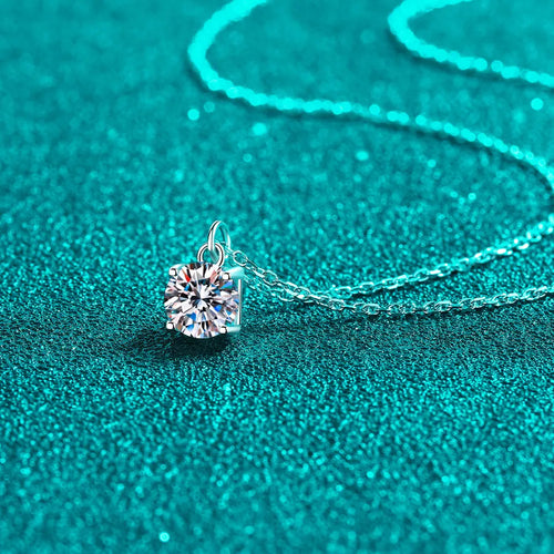 Sterling silver necklace with round moissanite solitaire pendant and chain