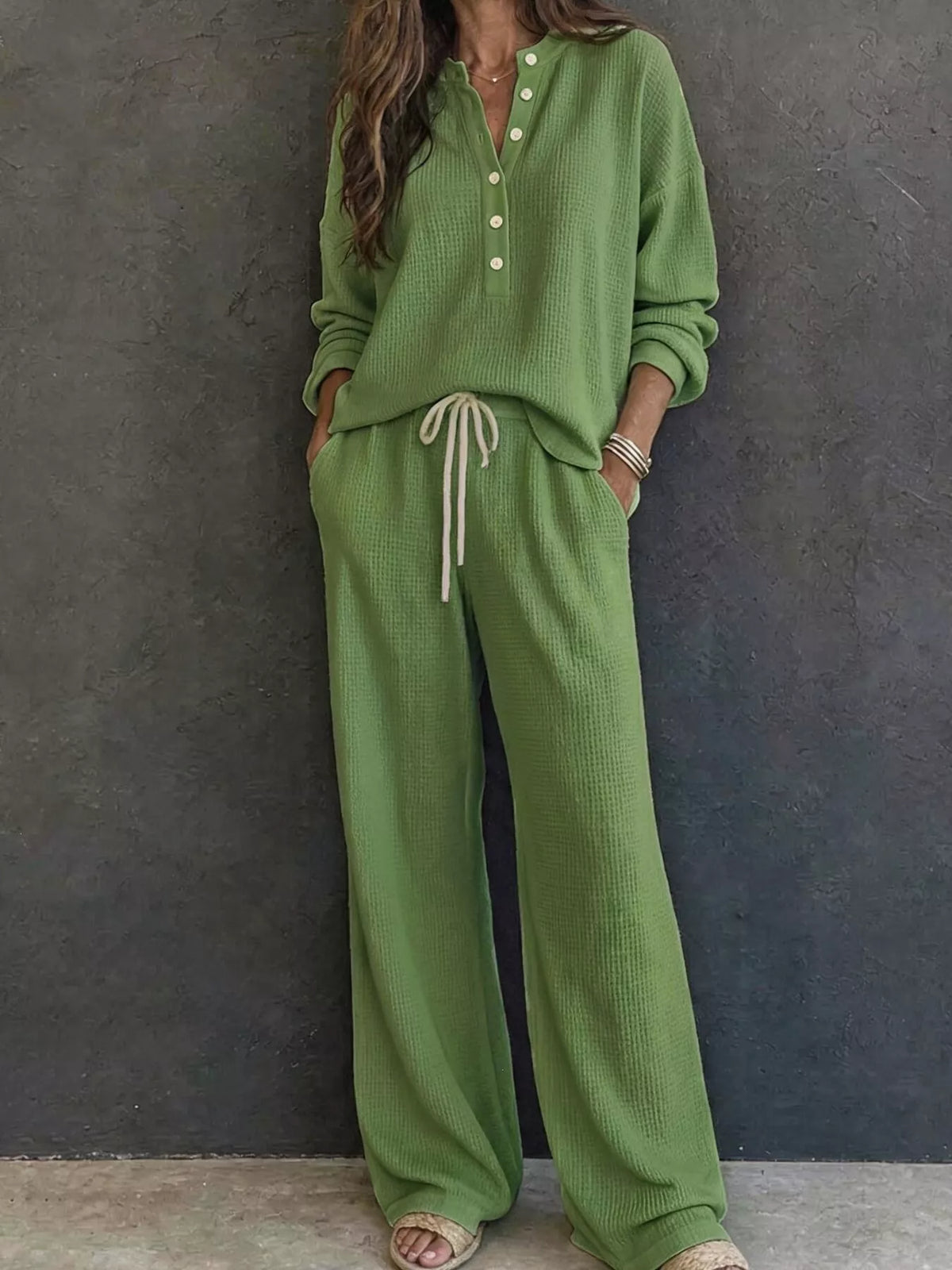 Green waffle-knit lounge set: button henley pullover and drawstring wide-leg pants.