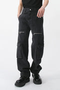 Dark loose-fit jeans with front cargo pockets and zipper details